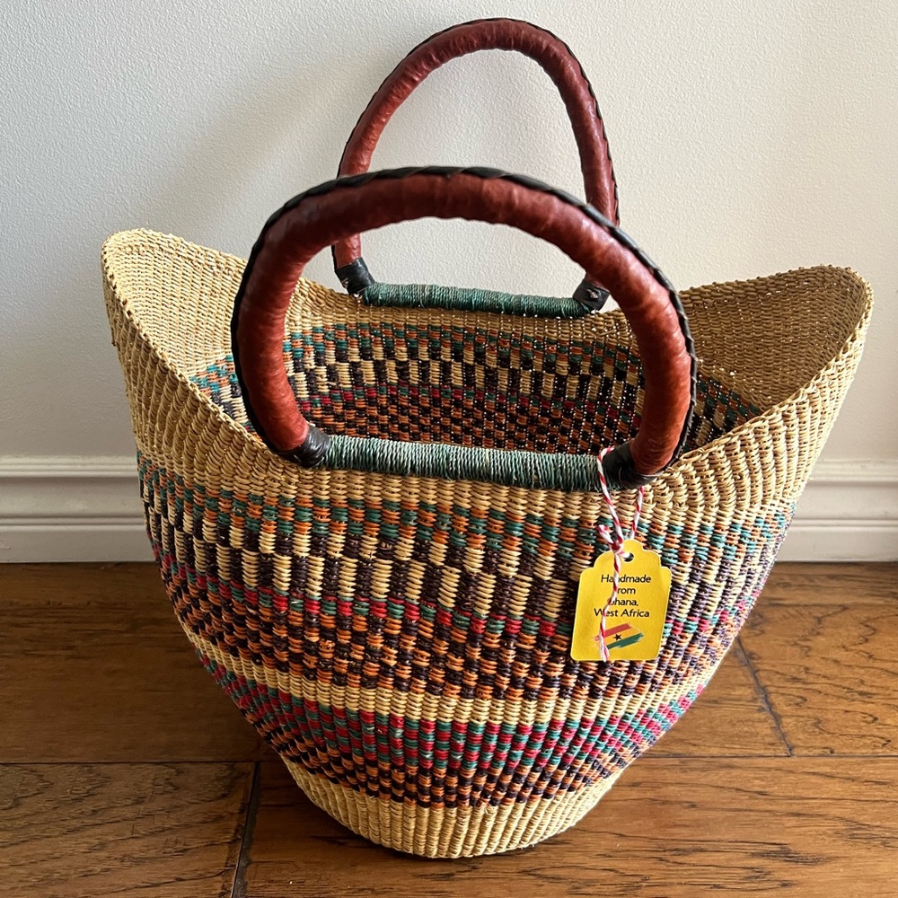 Handmade woven basket. Leather handle. Beautiful. New.